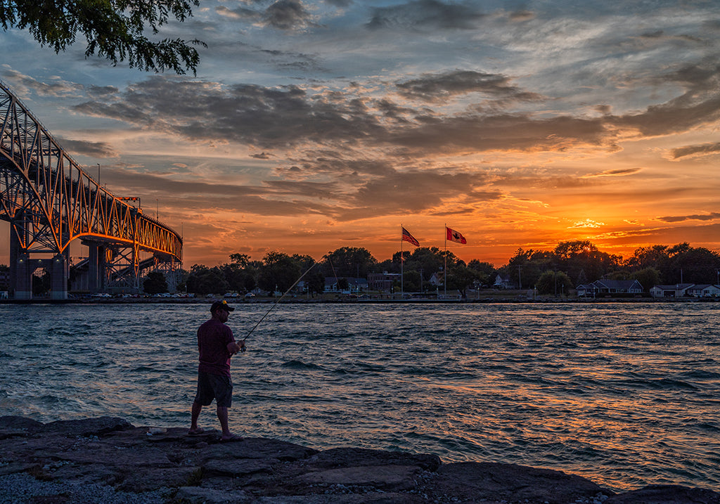 FISHING BY THE SUNSET