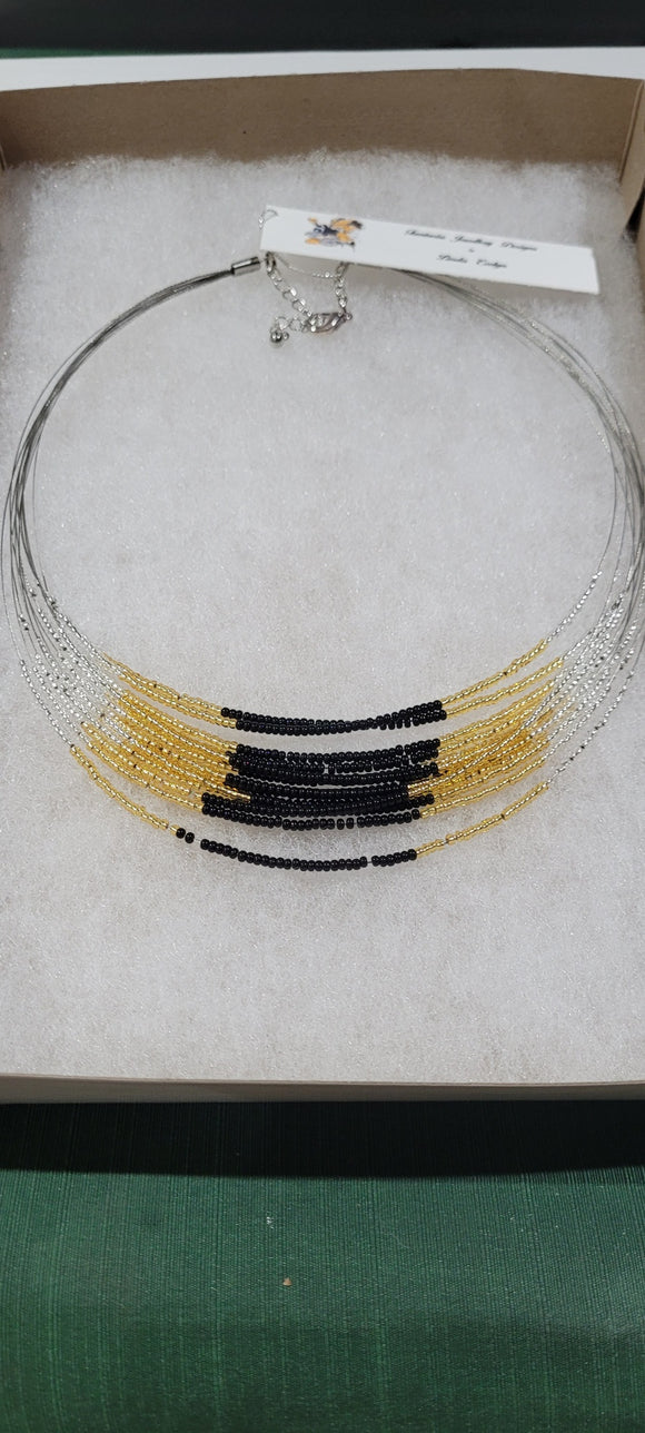 N23034 Multi-strand necklace blk/gold/silver